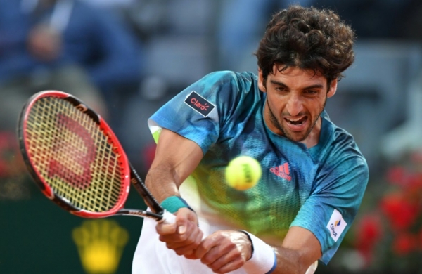 Bellucci em a&ccedil;&atilde;o contra Djokovic, em 12 de maio, em Roma