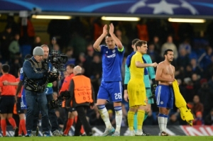 Chelsea's English defender John Terry (C) acknowledges the crowd at the end of the UEFA Champions League Group G football match between Chelsea and Porto at Stamford Bridge in London on December 9, 2015. AFP PHOTO / GLYN KIRK