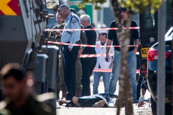 For&ccedil;as de seguran&ccedil;a israelenses isolam &aacute;rea de Hebron ap&oacute;s ataque de palestino que foi morto por agentes