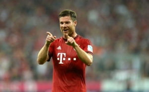 FILES - Picture taken on August 14, 2015, shows Bayern Munich's Spanish midfielder Xabi Alonso during the German first division Bundesliga football match FC Bayern Munich vs Hamburger SV at the Allianz Arena in Munich, southern Germany. Xabi Alonso does not exclude to remain at Munich beyond summer of 2016, the end of his initial contract, as he said in an interview with the daily Muenchner Merkur in the edition of September 4, 2015. AFP PHOTO / CHRISTOF STACHE