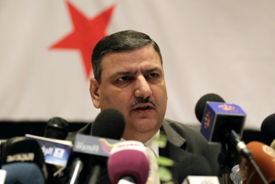 (Arquivo) Riad Hijab, coordenador-geral da oposi&ccedil;&atilde;o s&iacute;ria, participa de uma coletiva de imprensa em Am&atilde;, na Jord&acirc;nia, em 14 de agosto de 2012