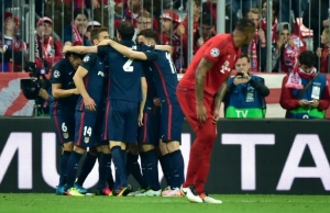 Jogadores do Atl&eacute;tico de Madri comemoram ap&oacute;s partida contra o Bayern de Munique, em Munique, no dia 3 de maio de 2016