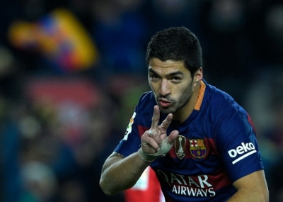 Barcelona's Uruguayan forward Luis Suarez celebrates after scoring during the Spanish league football match FC Barcelona vs Athletic Club Bilbao at the Camp Nou stadium in Barcelona on January 17, 2016. AFP PHOTO/ LLUIS GENE