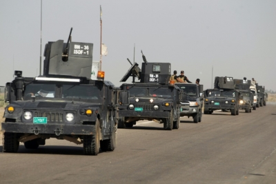 Combatentes da for&ccedil;a iraquiana de combate ao terrorismo se aproximam de Al-Sekhar, localidade da regi&atilde;o de Fallujah, em 28 de maio