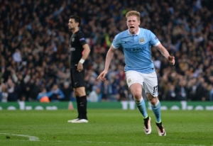 Manchester City's Belgian midfielder Kevin De Bruyne celebrates after scoring during the UEFA Champions league quarter-final second leg football match between Manchester City and Paris Saint-Germain at the Etihad stadium in Manchester on April 12, 2016.