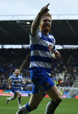 Reading's Irish defender Paul McShane celebrates after scoring during the FA cup fifth round football match between Reading and West Bromwich Albion at Madejski stadium in Reading on February 20, 2016.