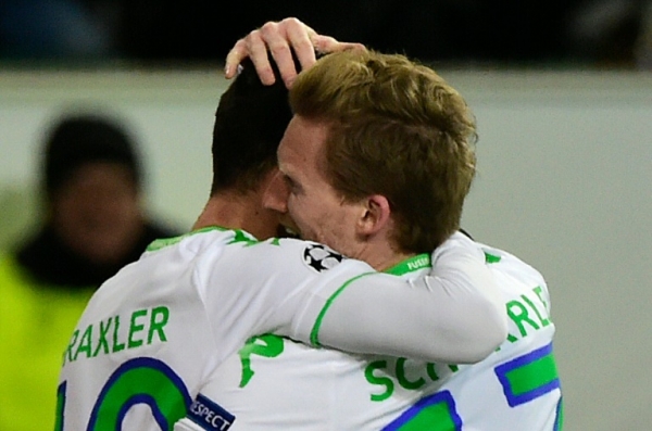Jogadores do Wolfsburg comemoram depois do gol marcado contra o Gent, em Wolfsburg, no dia 8 de mar&ccedil;o de 2016