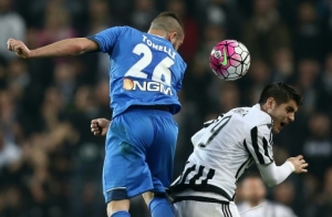 Empoli's defender Lorenzo Tonelli (L) fights for the ball with Juventus' forward Alvaro Morata from Spain during the Italian Serie A football match Juventus Vs Empoli on April 2, 2016 at the "Juventus Stadium" in Turin.