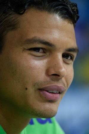 Brazil's national football team player Thiago Silva speaks to media before their training session at the Granja Comary CBF's training complex in Teresopolis, state of Rio de Janeiro, Brazil, on June 5, 2015. Brazil will play friendly matches against Mexico in Sao Paulo on June 7 and with Honduras in Port Alegre on June 10. AFP PHOTO/YASUYOSHI CHIBA