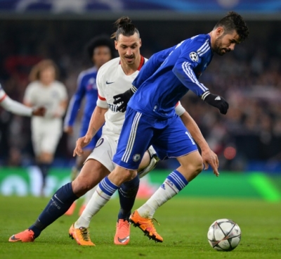 Chelsea's Brazilian-born Spanish striker Diego Costa (R) takes on Paris Saint-Germain's Swedish forward Zlatan Ibrahimovic (L) during the UEFA Champions League round of 16 second leg football match between Chelsea and Paris Saint-Germain (PSG) at Stamford Bridge in London on March 9, 2016.
