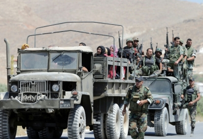 (2014) Soldados retiram moradores da cidade de Arsal, fronteira com a S&iacute;ria