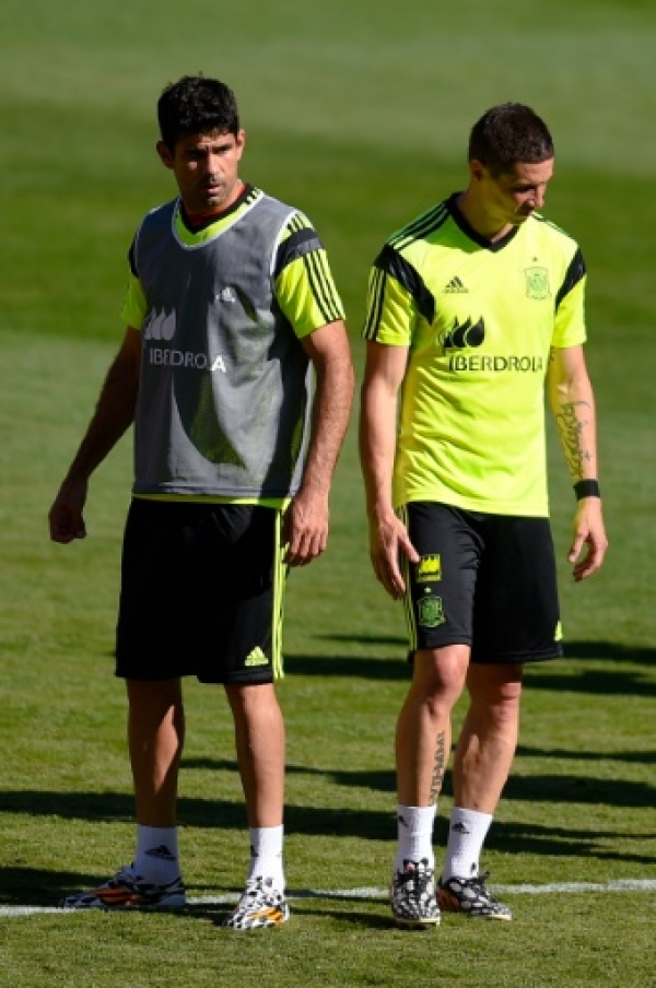 LANDOVER, MD - JUNE 06: Diego Costa (L) and Fernando Torres of Spain look on during a training session of the Spain National Team at the FedexField on June 6, 2014 in Landover, Maryland. David Ramos/Getty Images/AFPLANDOVER, MD - JUNE 06: Diego Costa (L) and Fernando Torres of Spain look on during a training session of the Spain National Team at the FedexField on June 6, 2014 in Landover, Maryland. David Ramos/Getty Images/AFP