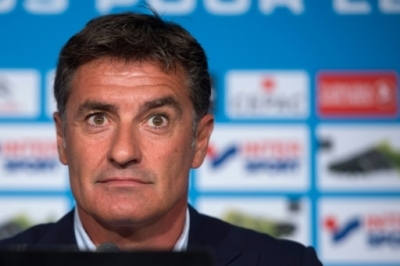 Marseille's Spanish head coach Jose Miguel Gonzalez Martin del Campo (aka Michel) takes part in a press conference on August 21, 2015 at the Robert Louis-Dreyfus training centre in Marseille, southern France, two days ahead of the French L1 football match Marseille vs Troyes. AFP PHOTO / BERTRAND LANGLOIS