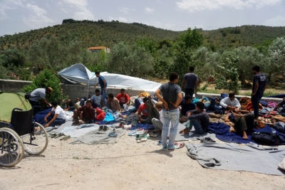 Migrantes e refugiados s&atilde;o vistos no campo de deten&ccedil;&atilde;o de Moria, em Lesbos, no dia 2 de junho de 2016