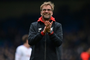 Liverpool's German manager Jurgen Klopp celebrates on the pitch after the English Premier League football match between Crystal Palace and Liverpool at Selhurst Park in south London on March 6, 2016.Liverpool won the game 2-1.
