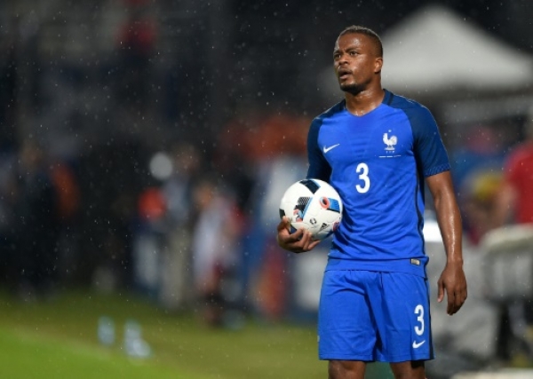 France's defender Patrice Evra looks on during the friendly football match between France and Scotland, at the Saint Symphorien Stadium in Metz, eastern France, on June 4, 2016, in preparation of the UEFA Euro 2016.France defeated Scotland 3-0.