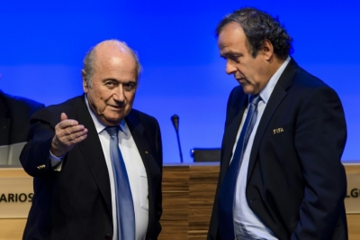 (Arquivo) Joseph Blatter (E) e Michel Platini durante congresso da Fifa em S&atilde;o Paulo em 11 de junho de 2014