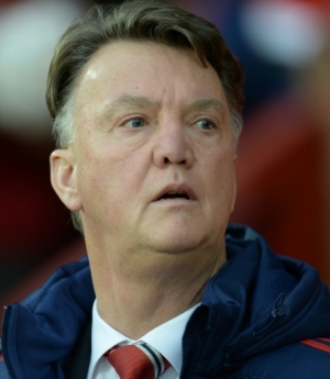 Manchester United's Dutch manager Louis van Gaal arrives for the English Premier League football match between Manchester United and Norwich City at Old Trafford in Manchester, north west England on December 19, 2015. Norwich won the game 2-1. AFP PHOTO / OLI SCARFF RESTRICTED TO EDITORIAL USE. NO USE WITH UNAUTHORIZED AUDIO, VIDEO, DATA, FIXTURE LISTS, CLUB/LEAGUE LOGOS OR 'LIVE' SERVICES. ONLINE IN-MATCH USE LIMITED TO 75 IMAGES, NO VIDEO EMULATION. NO USE IN BETTING, GAMES OR SINGLE CLUB/LEAGUE/PLAYER PUBLICATIONS.