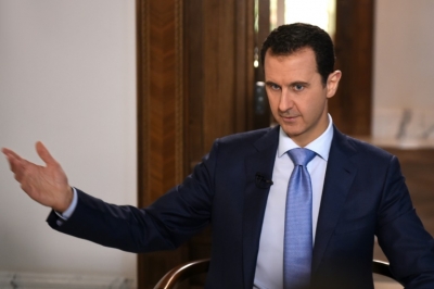 Foto divulgada pela ag&ecirc;ncia oficial SANA mostra o presidente s&iacute;rio Bashar al-Assad durante entrevista ao canal holand&ecirc;s NPO2 em Damasco