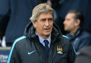 Manchester City's Chilean manager Manuel Pellegrini arrrives ahead of the English Premier League football match between Manchester City and Tottenham Hotspur at the Etihad Stadium in Manchester, north west England, on February 14, 2016.