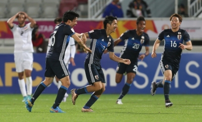 Jogadores do Jap&atilde;o comemoram gol durante partida contra o Iraque, em Doha, no dia 26 de janeiro de 2016