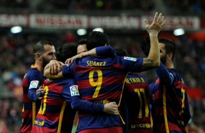 Jogadores do Barcelona comemoram gol durante partida contra o Real Sporting de Gijon, en Gij&oacute;n, no dia 17 de fevereiro de 2016