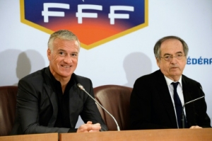 President of the French Football Federation (FFF) Noel le Graet (R) and French national football team head coach Didier Deschamps answers journalists' questions on February 12, 2015 at the FFF headquarters in Paris. Didier Deschamps has extended his contract as France coach until the 2018 World Cup in Russia, French football federation (FFF) president Noel Le Graet confirmed on February 12. AFP PHOTO/ BERTRAND GUAYPresident of the French Football Federation (FFF) Noel le Graet (R) and French national football team head coach Didier Deschamps answers journalists' questions on February 12, 2015 at the FFF headquarters in Paris. Didier Deschamps has extended his contract as France coach until the 2018 World Cup in Russia, French football federation (FFF) president Noel Le Graet confirmed on February 12. AFP PHOTO/ BERTRAND GUAY