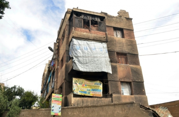 (Maio) Pr&eacute;dio destru&iacute;do em um distrito controlado pelo governo na cidade s&iacute;ria de Aleppo