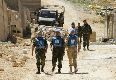 (Arquivo) Membros das Na&ccedil;&otilde;es Unidas visitam a cidade de Madaya, S&iacute;ria, em 6 de maio de 2012