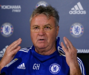 Chelsea's Dutch interim manager Guus Hiddink hosts a press conference at the club's training ground in Cobham, south west London, on December 23, 2015, ahead of their forthcoming English Premier League fixture against Watford on December 26. AFP PHOTO / GLYN KIRK RESTRICTED TO EDITORIAL USE. No use with unauthorized audio, video, data, fixture lists, club/league logos or 'live' services. Online in-match use limited to 75 images, no video emulation. No use in betting, games or single club/league/player publications.