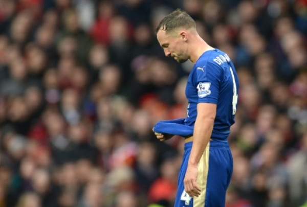 Leicester City's English midfielder Danny Drinkwater leaves the pitch after being sent off for two bookable offences during the English Premier League football match between Manchester United and Leicester City at Old Trafford in Manchester, north west England, on May 1, 2016.