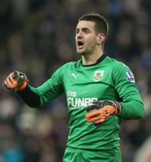 Burnley&rsquo;s English goalkeeper Tom Heaton reacts during the English Premier League football match between Newcastle United and Burnley at St James Park in Newcastle-upon-Tyne, northeast England, on January 1, 2015. AFP PHOTO / IAN MACNICOL RESTRICTED TO EDITORIAL USE. No use with unauthorized audio, video, data, fixture lists, club/league logos or &ldquo;live&rdquo; services. Online in-match use limited to 45 images, no video emulation. No use in betting, games or single club/league/player publications.Burnley&rsquo;s English goalkeeper Tom Heaton reacts during the English Premier League football match between Newcastle United and Burnley at St James Park in Newcastle-upon-Tyne, northeast England, on January 1, 2015. AFP PHOTO / IAN MACNICOL RESTRICTED TO EDITORIAL USE. No use with unauthorized audio, video, data, fixture lists, club/league logos or &ldquo;live&rdquo; services. Online in-match use limited to 45 images, no video emulation. No use in betting, games or single club/league/player publications.