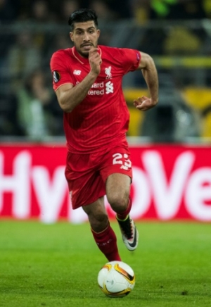 Liverpool's German midfielder Emre Can runs with the ball during the UEFA Europe League quarter-final, first-leg football match Borussia Dortmund vs Liverpool FC in Dortmund, western Germany on April 7, 2016.The match ended with a 1-1 draw.