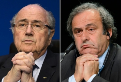 (FILES) a combination of file pictures made on October 29, 2015 shows two pictures showing Fifa president president Sepp Blatter (L) on May 30, 2015 in Zurich, and UEFA leader Michel Platini on May 28, 2015 in Zurich.