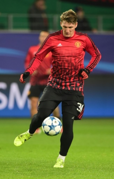 Manchester United's German midfielder Bastian Schweinsteiger is pictured prior to the UEFA Champions League Group B second-leg football match VfL Wolfsburg vs Manchester United in Wolfsburg, central Germany, on December 8, 2015. AFP PHOTO / JOHN MACDOUGALL