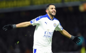 Leicester City's Algerian midfielder Riyad Mahrez celebrates scoring his team's first goal during the English Premier League football match between Watford and Leicester City at Vicarage Road Stadium in Watford, north of London on March 5, 2016.