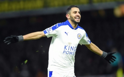 Leicester City's Algerian midfielder Riyad Mahrez celebrates scoring his team's first goal during the English Premier League football match between Watford and Leicester City at Vicarage Road Stadium in Watford, north of London on March 5, 2016.