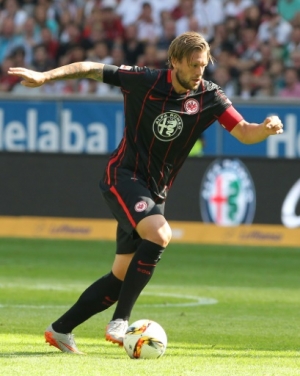 (FILES) This file photo taken on August 22, 2015 shows Frankfurt's defender Marco Russ during the German first division Bundesliga football match Eintracht Frankfurt v FC Augsburg, on August 22, 2015 in Frankfurt/Main. Marco Russ is suffering from a tumeur, discovered during the anti doping check up, said the club on May 19, 2016.
