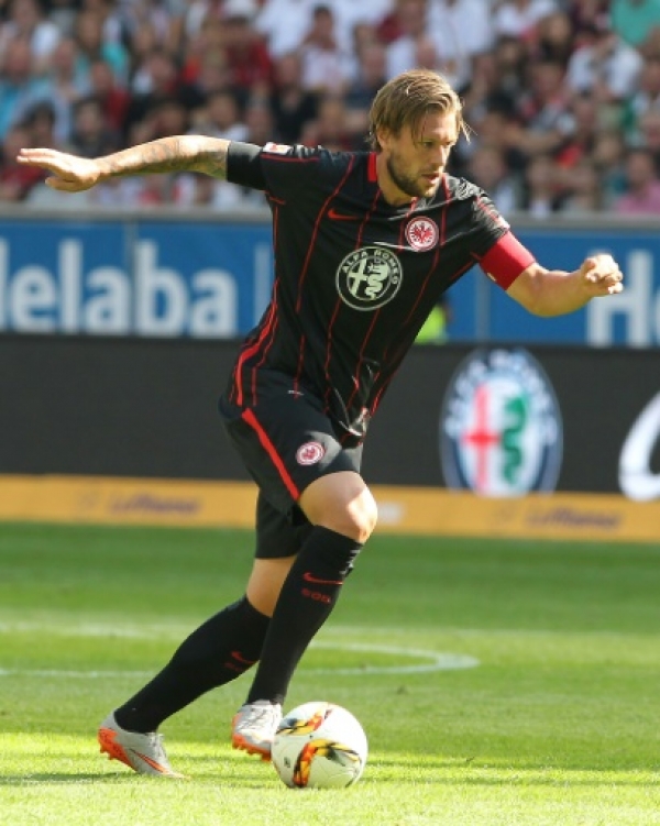 (FILES) This file photo taken on August 22, 2015 shows Frankfurt's defender Marco Russ during the German first division Bundesliga football match Eintracht Frankfurt v FC Augsburg, on August 22, 2015 in Frankfurt/Main. Marco Russ is suffering from a tumeur, discovered during the anti doping check up, said the club on May 19, 2016.