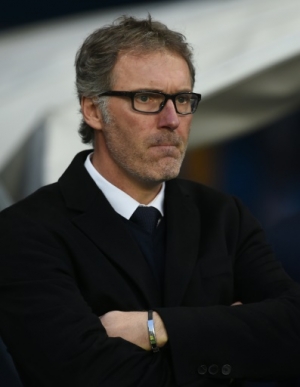 Paris Saint-Germain's French head coach Laurent Blanc looks on during the UEFA Champions league quarter-final second leg football match between Manchester City and Paris Saint-Germain at the Etihad stadium in Manchester on April 12, 2016.