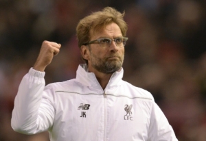 Liverpool's German manager Jurgen Klopp celebrates after winning the UEFA Europa league quarter-final second leg football match between Liverpool and Borussia Dortmund at Anfield stadium in Liverpool on April 14, 2016.