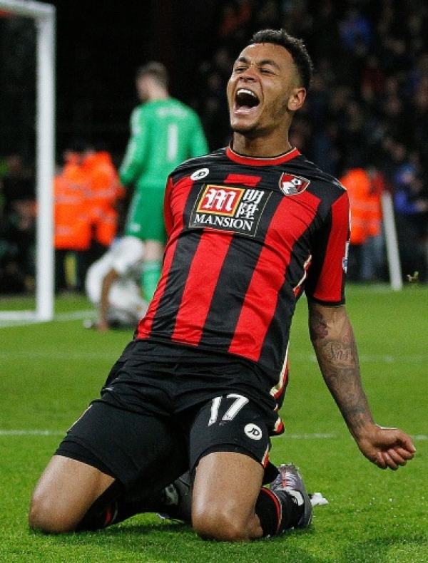 Bournemouth's Norwegian striker Joshua King celebrates scoring his team's second goal during the English Premier League football match between Bournemouth and Manchester United at the Vitality Stadium in Bournemouth, southern England on December 12, 2015. AFP PHOTO / IKIMAGES RESTRICTED TO EDITORIAL USE. No use with unauthorised audio, video, data, fixture lists, club/league logos or "live" services. Online in-match use limited to 45 images, no video emulation. No use in betting, games or single club/league/player publications.