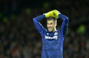 West Ham United's Spanish goalkeeper Adrian reacts after a missed chance during the English Premier League football match between Manchester United and West Ham United at Old Trafford in Manchester, north west England, on December 5, 2015. AFP PHOTO / OLI SCARFF RESTRICTED TO EDITORIAL USE. No use with unauthorized audio, video, data, fixture lists, club/league logos or 'live' services. Online in-match use limited to 75 images, no video emulation. No use in betting, games or single club/league/player publications.