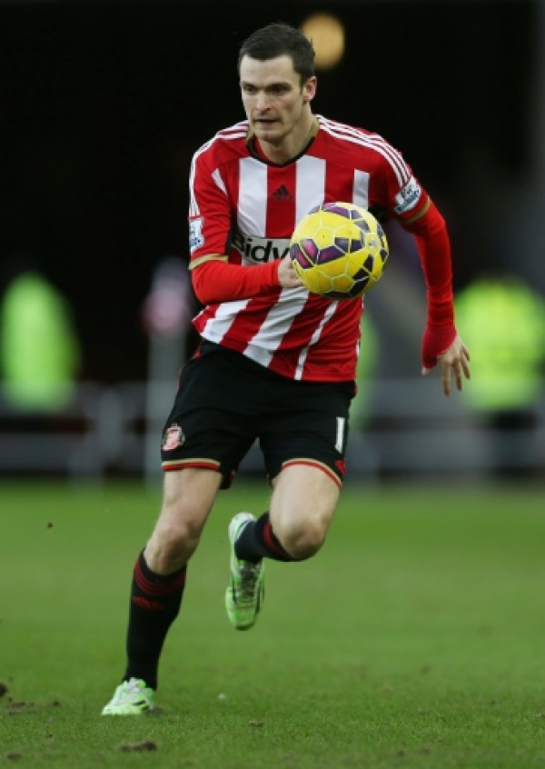(FILES) This file photo taken on January 31, 2015 shows Sunderland's English midfielder Adam Johnson chasing the ball during the English Premier League football match between Sunderland and Burnley at the Stadium of Light in Sunderland, northeast England on January 31, 2015.