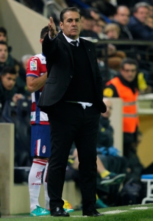 Granada's coach Jose Ramon Sandoval gestures on the sideline during the Spanish league football match Villarreal CF vs Granada FC at El Madrigal stadium in Villareal on January 30, 2016. AFP PHOTO/ JOSE JORDAN