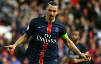 (FILES) This file photo taken on April 16, 2016 shows Paris Saint-Germain's Swedish forward Zlatan Ibrahimovic celebrating after scoring a goal during the French L1 football match between Paris Saint-Germain and Caen at the Parc des Princes stadium in Paris on April 16, 2016. For the third time Ibrahimovic was nominated best player of the Ligue 1 for the 25th edition of the UNFP (French National Professional Football players Union) trophy ceremony on May 8, 2016.