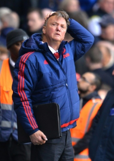 Manchester United's Dutch manager Louis van Gaal leaves the pitch after losing the English Premier League football match between Tottenham Hotspur and Manchester United at White Hart Lane in London, on April 10, 2016. Tottenham won 3-0.