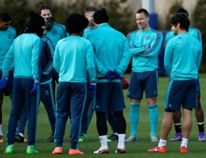 Chelsea's English defender John Terry (3R) participates in a team training session at the club's complex in Cobham, Surrey on February 15, 2016.Chelsea play Paris St-Germain in the last-16 round of matches in the Champions League on February 16, 2016.