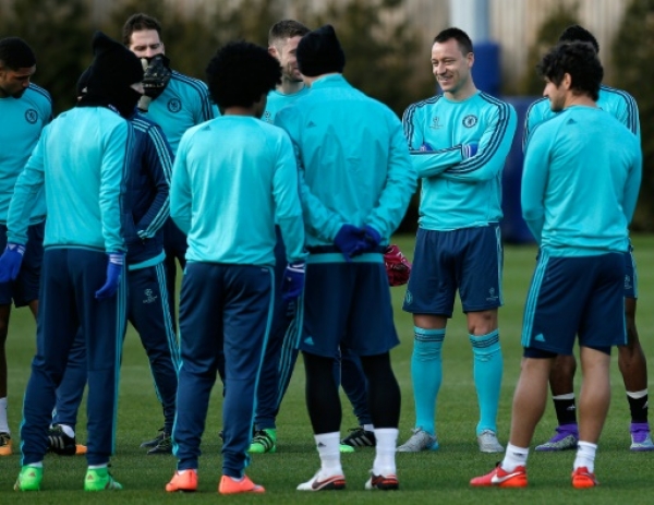 Chelsea's English defender John Terry (3R) participates in a team training session at the club's complex in Cobham, Surrey on February 15, 2016.Chelsea play Paris St-Germain in the last-16 round of matches in the Champions League on February 16, 2016.